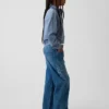 Jeans pour enfant à taille basse, coupe large et motif floral brodé