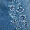 Jeans pour enfant à taille basse, coupe large et motif floral brodé