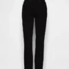 Jeans slim vintage à taille mi-haute