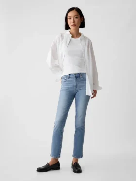 Jeans slim vintage à taille mi-haute et ourlet fendu