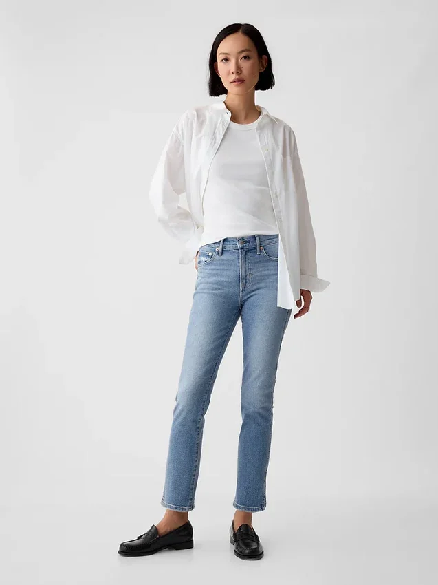 Jeans slim vintage à taille mi-haute et ourlet fendu