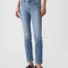 Jeans slim vintage à taille mi-haute et ourlet fendu