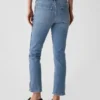 Jeans slim vintage à taille mi-haute et ourlet fendu