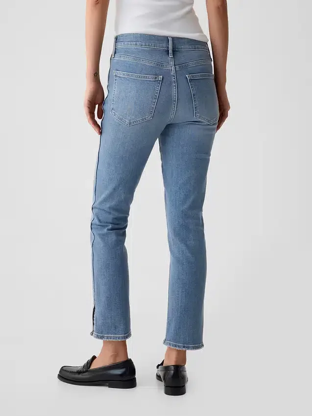 Jeans slim vintage à taille mi-haute et ourlet fendu
