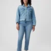 Jeans slim vintage à taille mi-haute et ourlet fendu