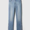 Jeans slim vintage à taille mi-haute et ourlet fendu