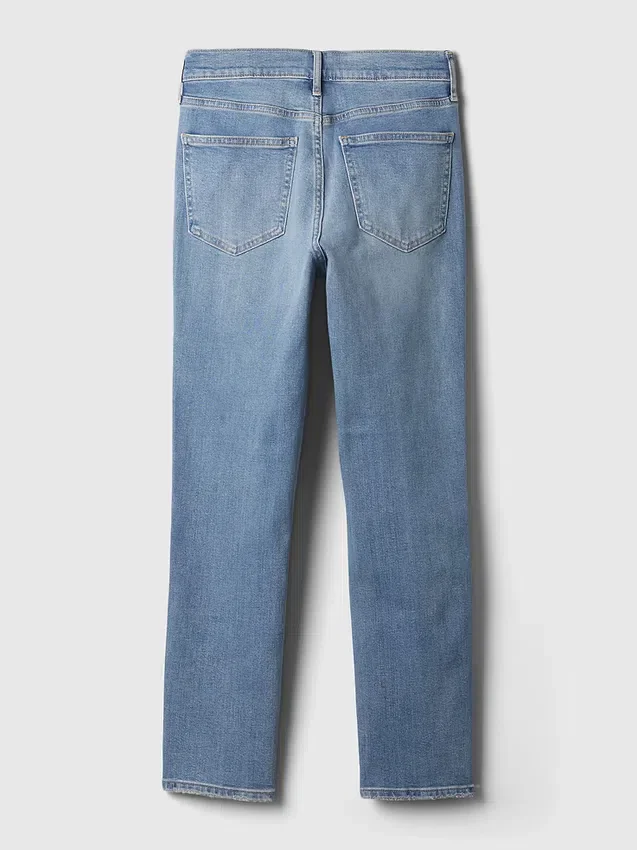 Jeans slim vintage à taille mi-haute et ourlet fendu