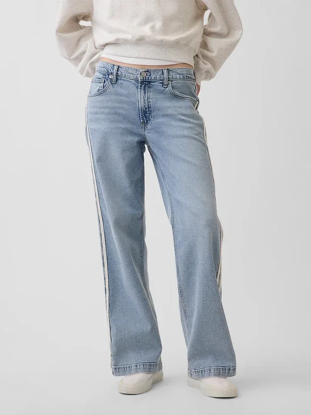 Jeans taille basse des années 90, coupe ample avec rayures latérales