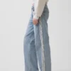 Jeans taille basse des années 90, coupe ample avec rayures latérales