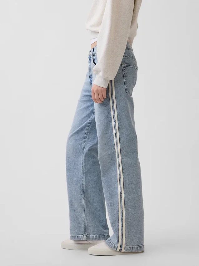 Jeans taille basse des années 90, coupe ample avec rayures latérales