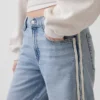 Jeans taille basse des années 90, coupe ample avec rayures latérales