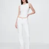 Jeans taille basse, long et ajusté