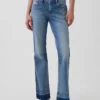 Jeans taille basse, long et ajusté