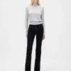 Jeans taille basse, long et ajusté, à lacets