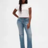 Jeans taille basse, long et ajusté, à lacets