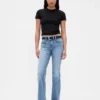 Jeans taille basse à poches tressées, coupe longue et ajustée