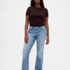 Jeans taille basse à poches tressées, coupe longue et ajustée