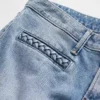 Jeans taille basse à poches tressées, coupe longue et ajustée