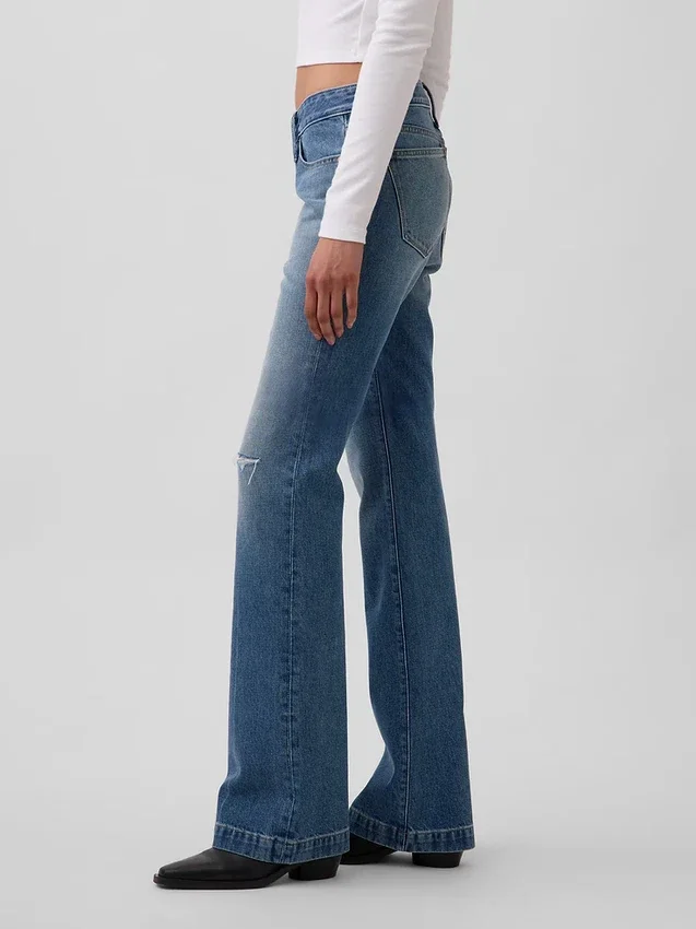 Jeans taille basse, rigides, long et ajusté