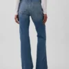 Jeans taille basse, rigides, long et ajusté