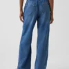 Jeans taille basse ultra-doux, ample style années 90, à ourlet en forme de dauphin
