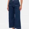 Jeans taille haute à coupe ample et jambes larges, longueur cheville, pour silhouettes rondes
