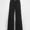 Jeans taille haute à jambes larges et longueur cheville