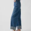 Jeans taille haute à jambes larges et revers