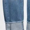 Jeans taille haute à jambes larges et revers