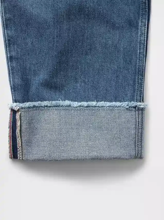 Jeans taille haute à jambes larges et revers