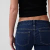 Jeans taille très basse, long et ajusté