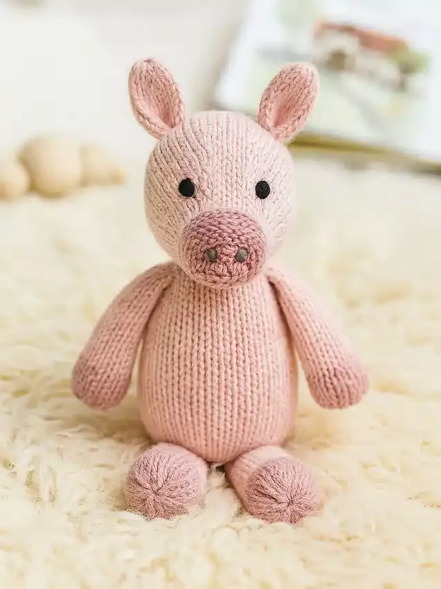 Jouet en tricot en forme de cochon