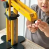 Jouet « Petite grue jaune » pour tout-petits