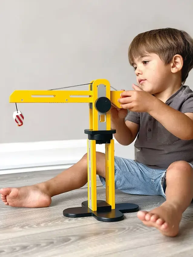 Jouet « Petite grue jaune » pour tout-petits