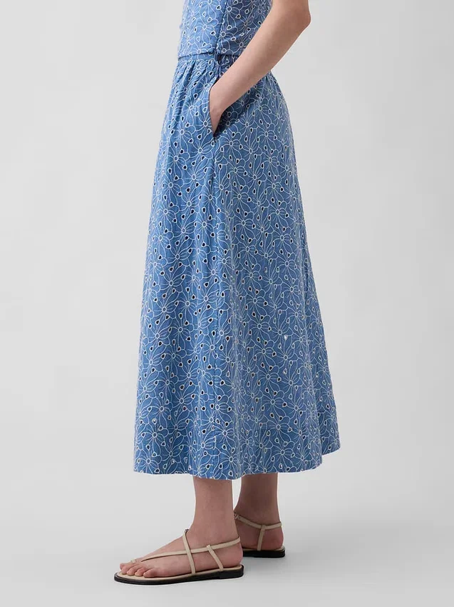Jupe longue à œillets à taille haute