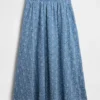 Jupe longue à œillets à taille haute
