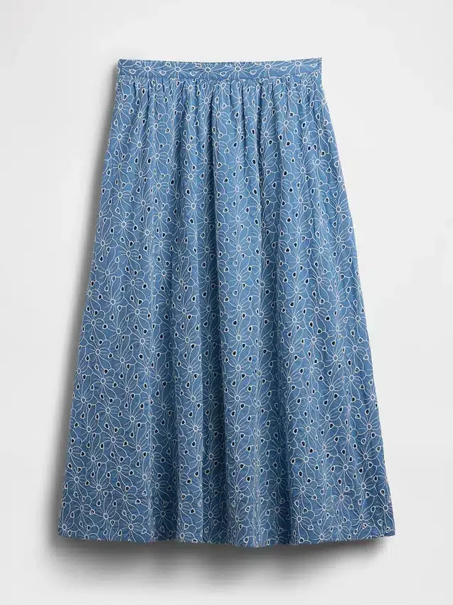 Jupe longue à œillets à taille haute