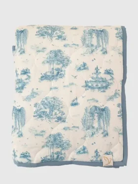 Le tapis de jeu matelassé « Gilded Bird Spring Toile »