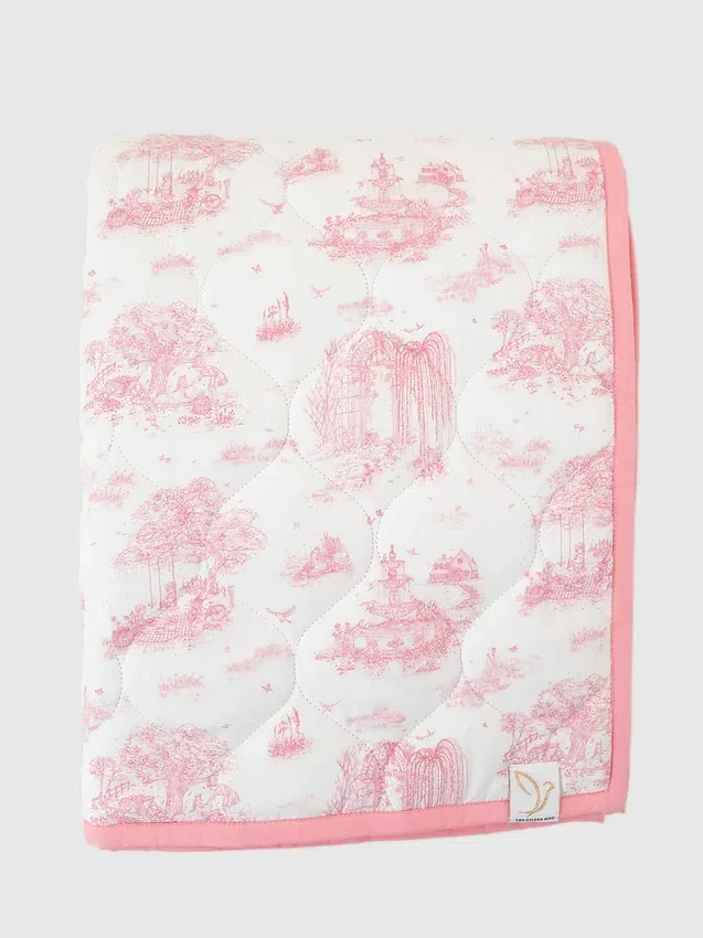 Le tapis de jeu matelassé « Gilded Bird Spring Toile »