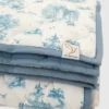 Le tapis de jeu matelassé « Gilded Bird Spring Toile »