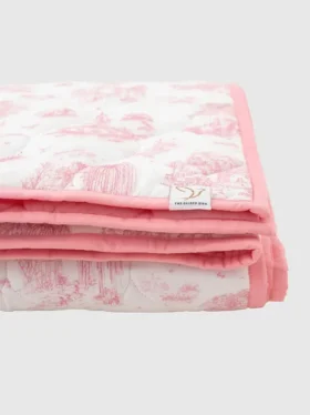Le tapis de jeu matelassé « Gilded Bird Spring Toile »