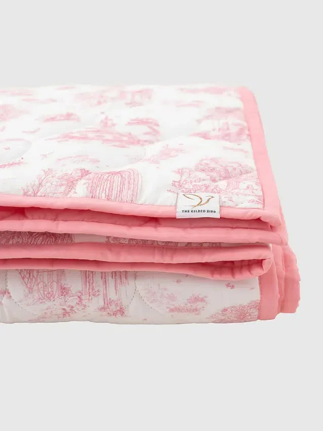 Le tapis de jeu matelassé « Gilded Bird Spring Toile »