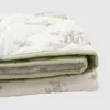 Le tapis de jeu matelassé « Safari Toile » de The Gilded Bird