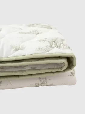 Le tapis de jeu matelassé « Safari Toile » de The Gilded Bird