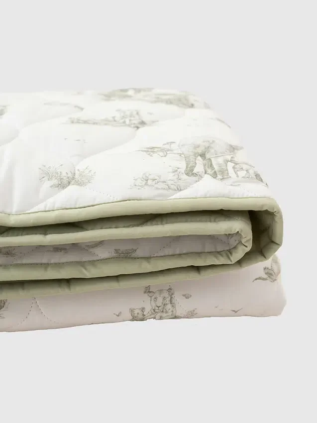 Le tapis de jeu matelassé « Safari Toile » de The Gilded Bird