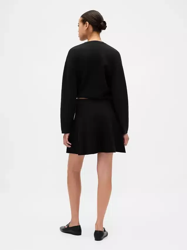 Mini-jupe en pull plissé
