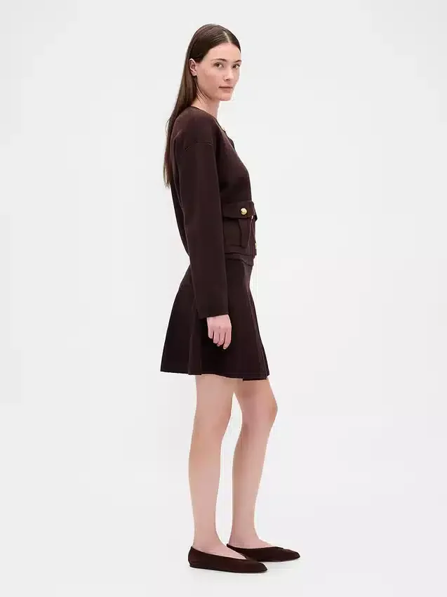 Mini-jupe en pull plissé