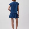 Mini-jupe-short en denim de gaze de coton à taille smockée