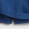 Mini-jupe-short en denim de gaze de coton à taille smockée