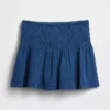 Mini-jupe-short en denim de gaze de coton à taille smockée